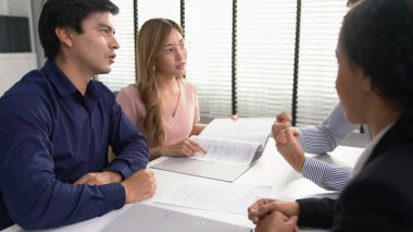 Commercial contract signed by competent people of various ethnicities. Trade agreements, two-party business transactions.