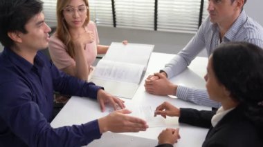Commercial contract signed by competent people of various ethnicities. Trade agreements, two-party business transactions.