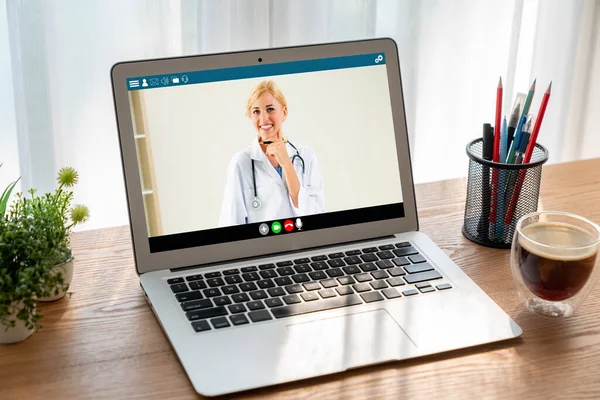 Doctor video call online by modish telemedicine software application for virtual meeting with patient