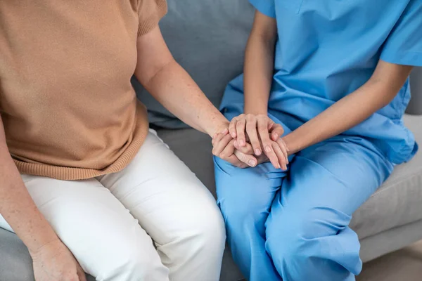 Contented Senior Woman Visited Her Personal Caregiver Hold Each Others — Stok fotoğraf