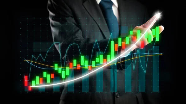 Businessman draw finance allusive graph chart showing business profit growth increasing to future target . Excellent financial status of corporate business rise up . Finance and money technology .