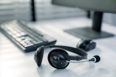 Essential equipment concept for competent online operators, call service agents, or online working. Customer service equipment, as well as helpdesk tools.