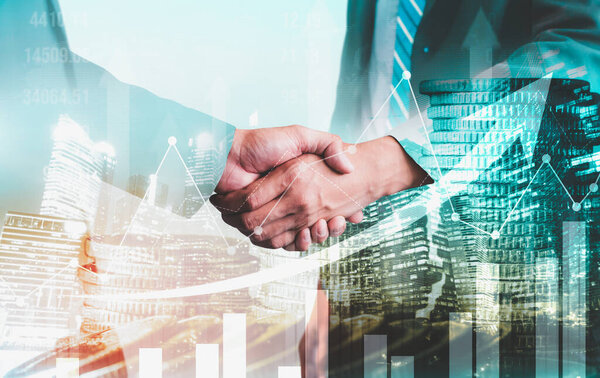 Business handshake on finance prosperity and money technology asset background . Economy and financial growth by investment in valuable stock market to gain wealth profit form currency trading