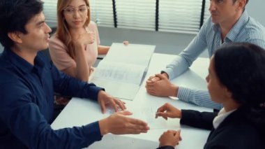Commercial contract signed by competent people of various ethnicities. Trade agreements, two-party business transactions.