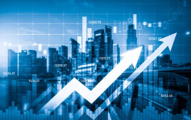 As background for a financial or business concept, digital screen and financial graphs overlap on a picture of modernistic cityscape, skyscrabbers.