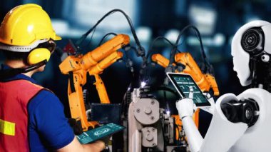 Cybernated industry robot and human worker working together in future factory . Concept of artificial intelligence for industrial revolution and automation manufacturing process .