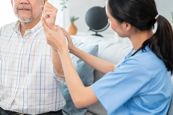 Caring Young Female Doctor Performing Osteopathy Treatment Contented Senior Patient — Foto Stock