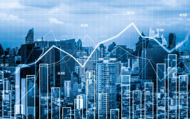 As background for a financial or business concept, digital screen and financial graphs overlap on a picture of modernistic cityscape, skyscrabbers.